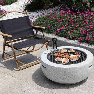 Blanc 3 en 1 rond Poêle à bois Charbon de bois Grill Table de barbecue Poêle à feu en pierre artificielle avec logo personnalisé