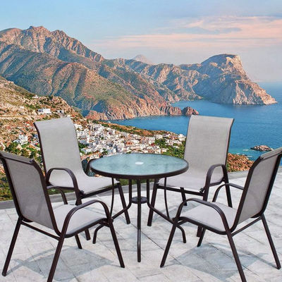 Ensemble de jardin en extérieur en aluminium avec table à manger en verre rond et chaises Teslin